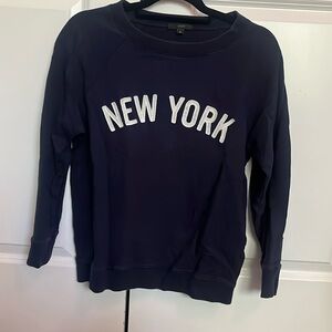 New York white letters and navy blue sweatshirt